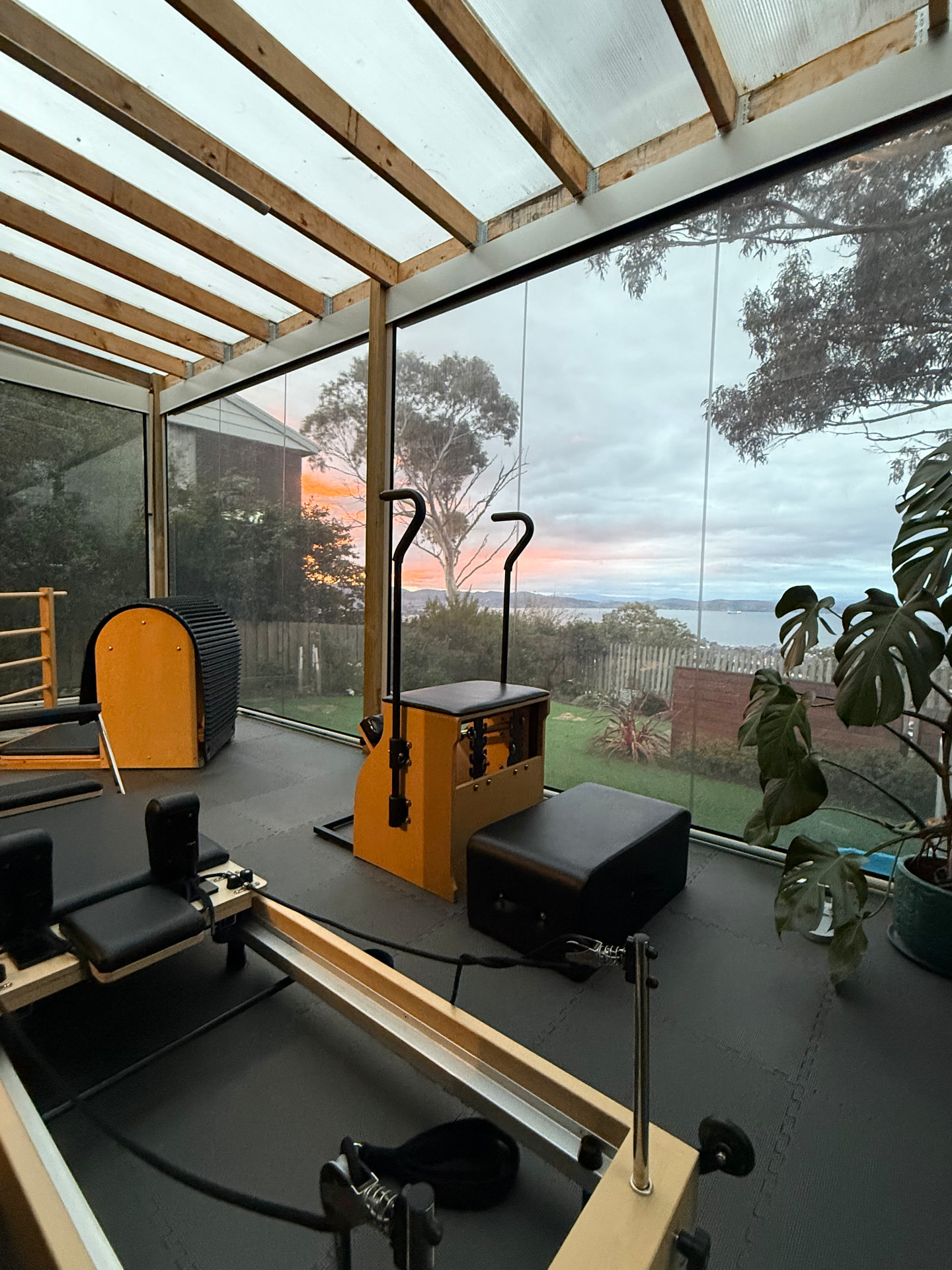 Studio reformer and chair at sunset with views over the River Derwent